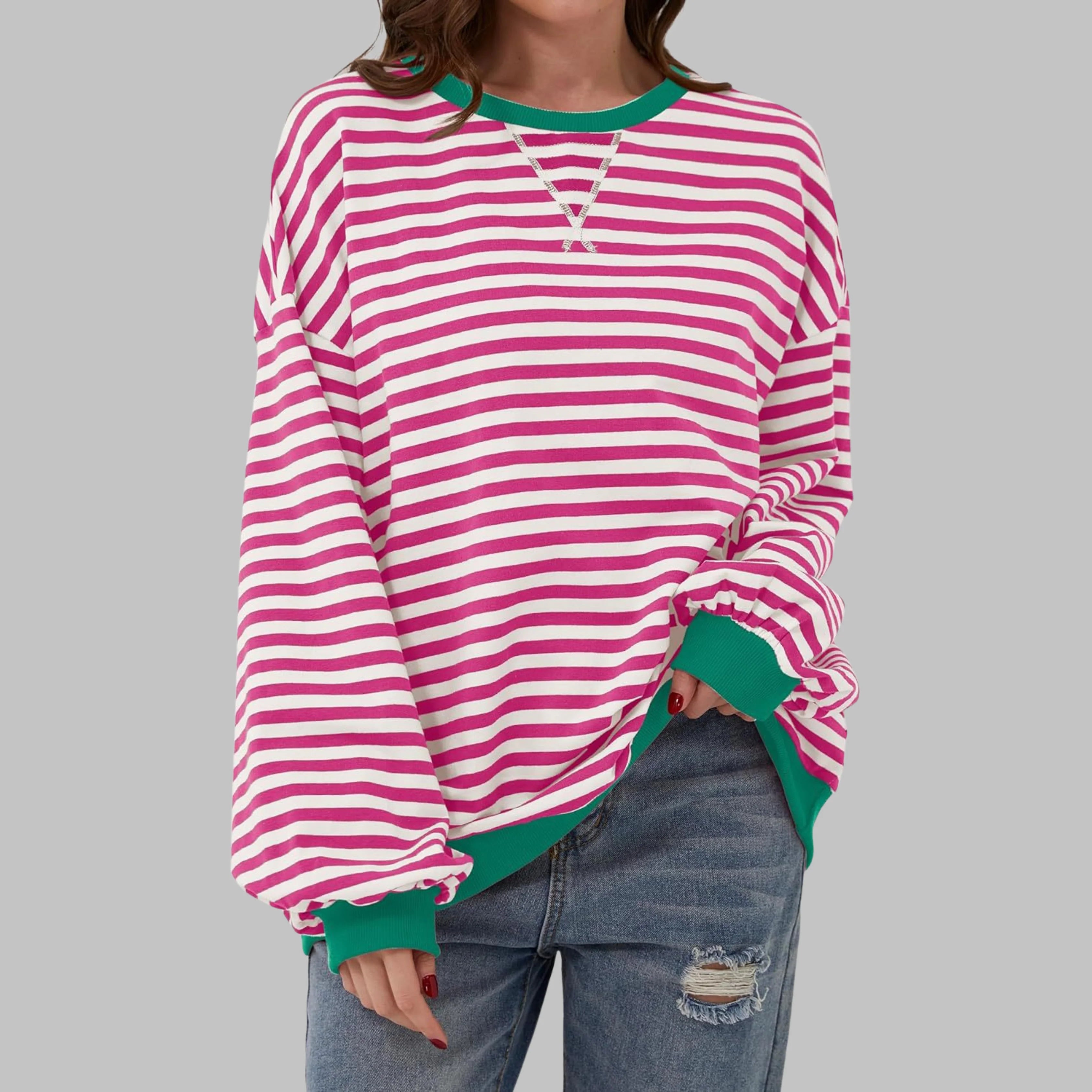 Striped pullover jumper showing oversized fit and comfortable knit fabric construction
