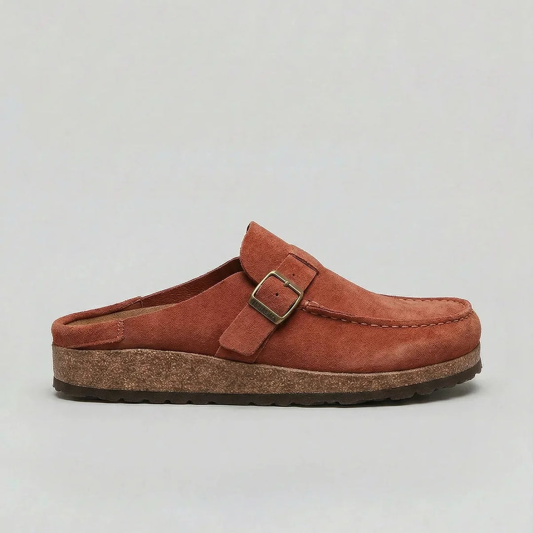 Women's suede clogs in neutral tone with textured grip outsole
