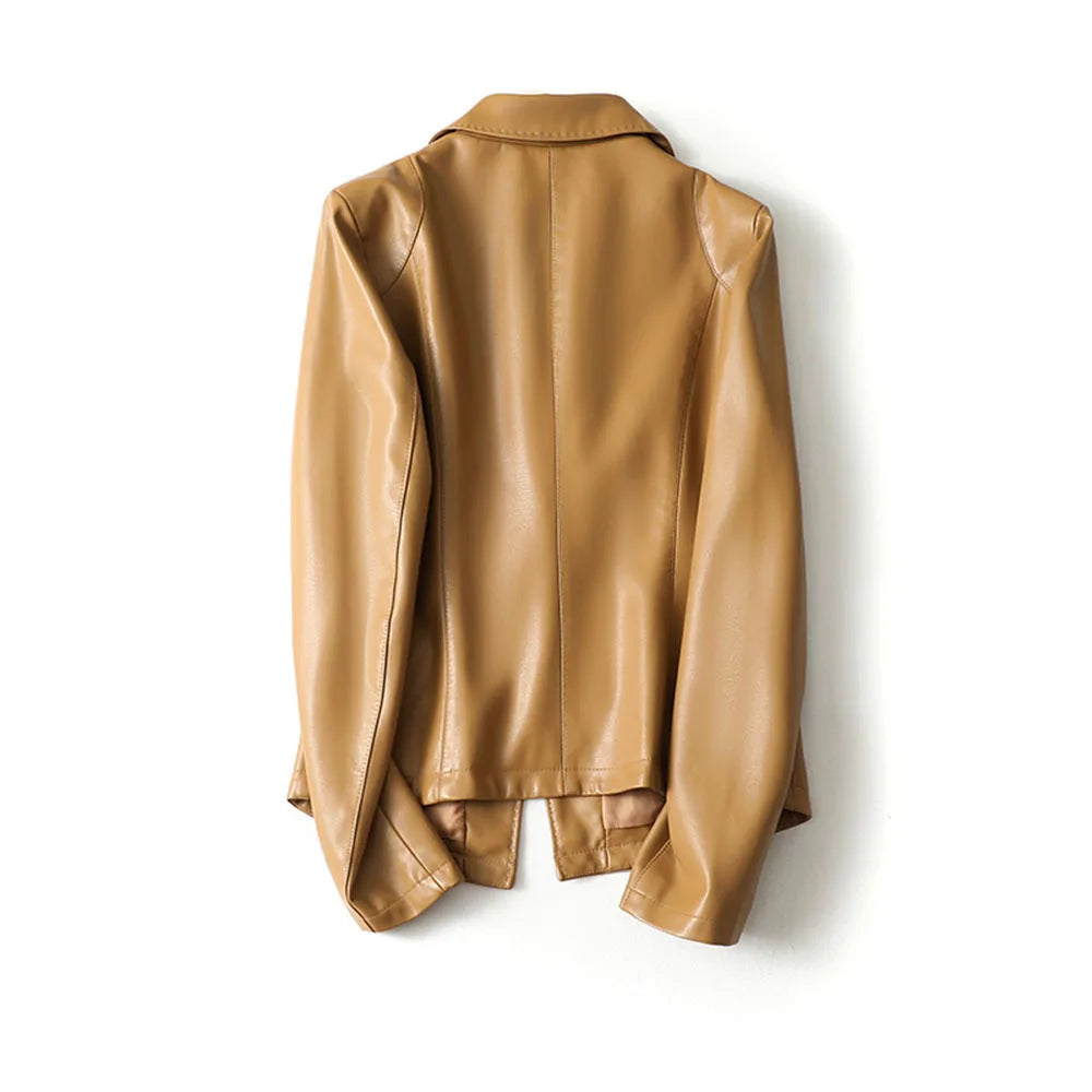 Close-up of women's tailored blazer showing structured lapels and smooth finish