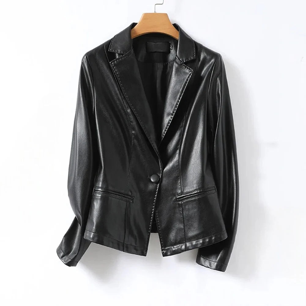 Side view of women's tailored blazer displaying fitted waist and sleek silhouette